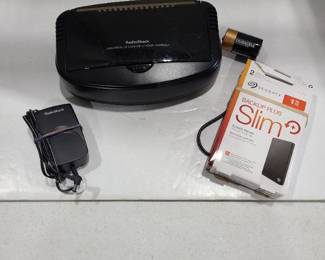 Radio Shack battery charger and Slim backup plus