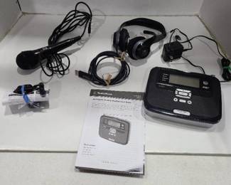 Radio Shack weather radio microphone headphones and armband radio