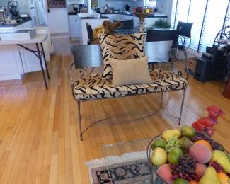 Metal bench with animal print cushion/accent pillow