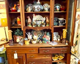 Handcrafted Hutch with a large rooster collection. 