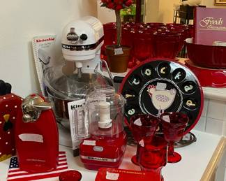 Kitchen Aid mixer and various other small appliances.