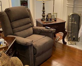 Lifting overstuffed power recliner.