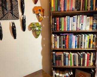 More of the large book collection and a vintage, collectible, stuffed Fort Worth National Bank toy.