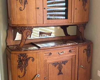 Gorgeous breakfront and fish decor