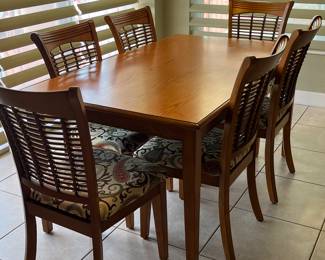 Kitchen set and bar stools are matching 