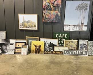 various framed artwork and signage