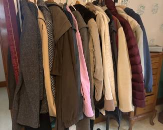 The primary bedroom also holds lots of ladies  outerwear! All are in excellent condition! 