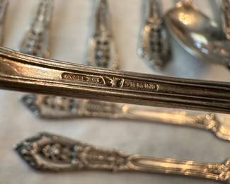 This is a simply beautiful 24 piece Wallace Sterling Silver in the ROSE POINT pattern. Service for four, plus serving pieces! 