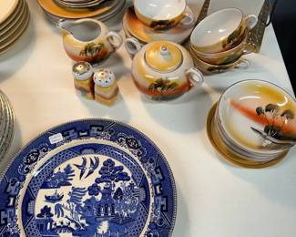 The cubbies in the basement have just revealed totes filled with glass and china! Buffalo Pottery and a sweet little Made In Japan Tea Set!