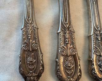 This is a simply beautiful 24 piece Wallace Sterling Silver in the ROSE POINT pattern. Service for four, plus serving pieces! 