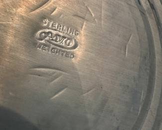 A pair of Sterling candlesticks. 