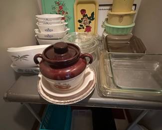Lots of vintage Pyrex and tempered glass! In the back you can see some vintage Tupperware, and some super cool MCM Painted Tin Trays! 