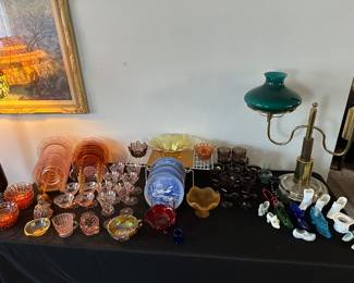 A banquet table filled with beautiful depression glass and other vintage treasures! 