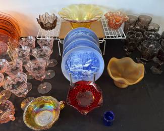 A banquet table filled with beautiful depression glass and other vintage treasures! 