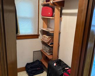 This closet is filled with sweaters, luggage and such! Many of the sweaters are Woolrich!  Also there are several sewing basket/boxes for your consideration! 