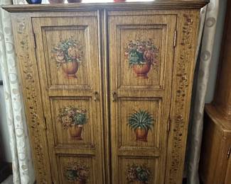 A simply beautiful painted cabinet! It is in absolutely superb condition and would work with ANY decor! 