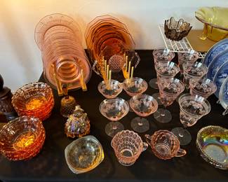 A banquet table filled with beautiful depression glass and other vintage treasures! 