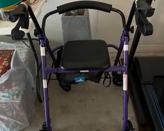 Walker with hand brakes and storage