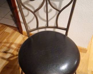 Three swivel bar chairs