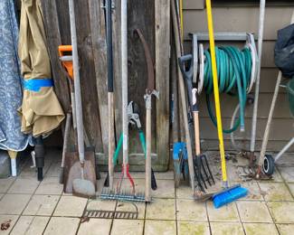 Assortment of Gardening Tools - Rakes, Pitchfork, Shovels