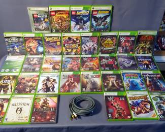 Xbox 360 Video Games Including Mass Effect Trilogy, Fable II, Lego Star Wars 2, Lego Batman 3, Super Street Fighter IV, Mortal Kombat, Assorted WWE Games, And More, And Xbox AV Component Cable