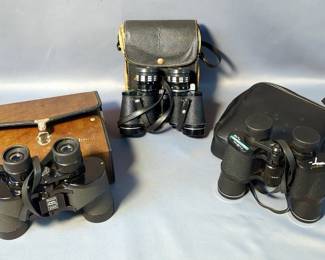 Binoculars Including Bushnell Insta Focus, 40mm, Empire, 6 x 12 x 30, And Tasco Zip, 7 x 35mm, All In Carry Cases