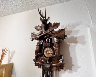Amazing black Forrest cuckoo clock with dancers and all original weights. Wonderful condition!
