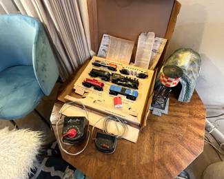 Cool train… looks complete… large table with track is in the garage and it will be cheap.