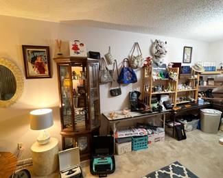 Designer bags, how are you this, sterling silver jewelry, mid-century modern furniture, cool vintage Christmas pieces, tons of DVDs, CDs and some record. Model cars handmade pottery leather belts, knives, vintage items, retro furniture, authentic vintage clothing… This is a really great sale guys.