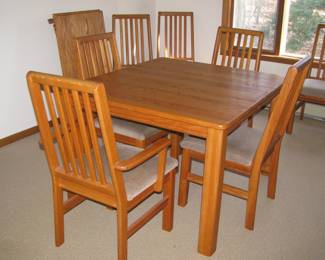 Dining table with leaves out. 