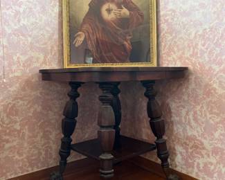 Bad to the bone ball and claw foot parlor table.  Someone was very creative back in the day with this leg design before Pinterest. 