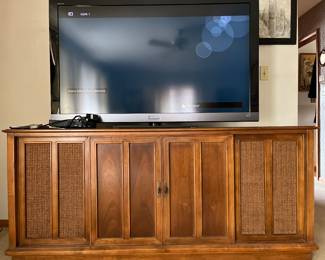 Vintage mid century cabinet.  I like the weaved profile.