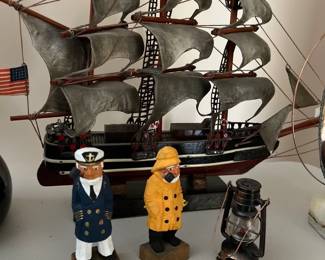 sail boat figurine with sailors