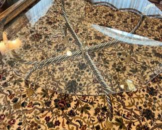 glass table with silver and gold brass rope legs and tassel feet