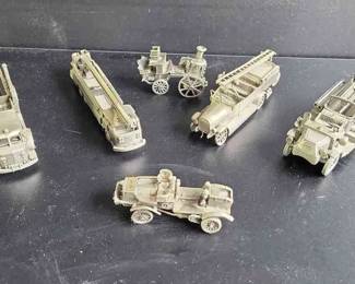 Six Vintage Pewter Fire Trucks