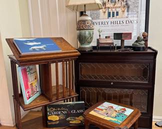 Revolving Oak Bookcase/stand, Barister Bookcase with Leaded Glass, Wooden carved Curiosities, Glazed Ceramic Table Lamp, and "Santa Barbara, Queen of the Missions" tile inlaid table