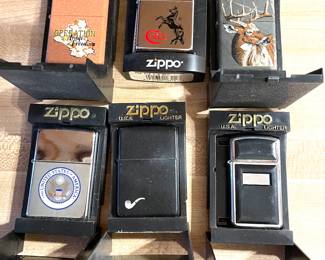 Large collection of old zippos