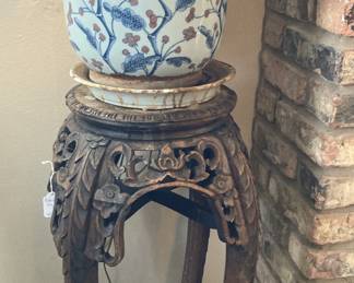 Carved plant stand