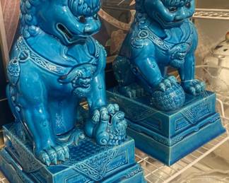 Pair of turquoise -colored porcelain foo dogs