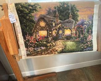 Unfinished needlework and stand