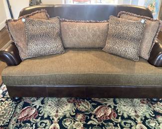 Leather and cloth sofa; decorative pillows