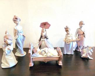 Lladro:  Rock a Bye Baby (retired) - Sleepy Kitten (retired) - 1997 Pocket Full of Wishes - Girl with Pink Umbrella (retired) - 1987 Girl with Mandolin - Medieval Soldier (Retired 1996) - 1984 Cat & Mouse