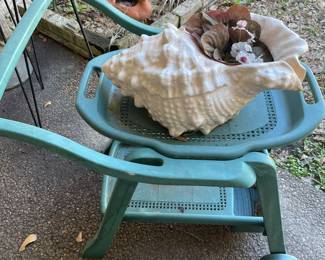 table-side serving cart on wheels with removable serving tray.  Large ceramic shell planter