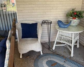 Whicker chair and glass-top wicker table