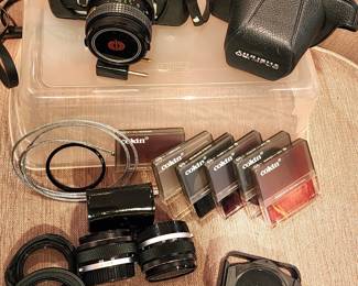 Olympus OM-1 35mm camera with case and accessories