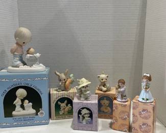 Precious Moments Figurines including Somebunny Cares