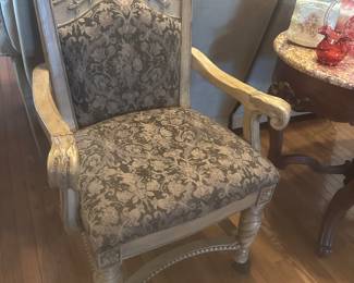 Two of four chairs that match the dining table and curio cabinet, chairs are on casters.  Table is octagon shape marble top 
