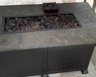 Lots of outdoor furniture, sound system and fire pit