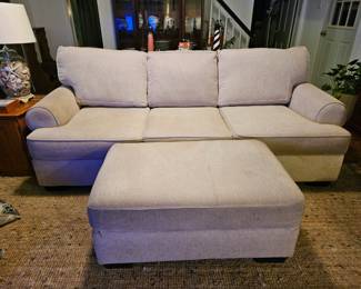 Very comfy sofa and matching ottoman, shows some wear