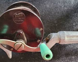 Vintage Penn 77 Reel on rod